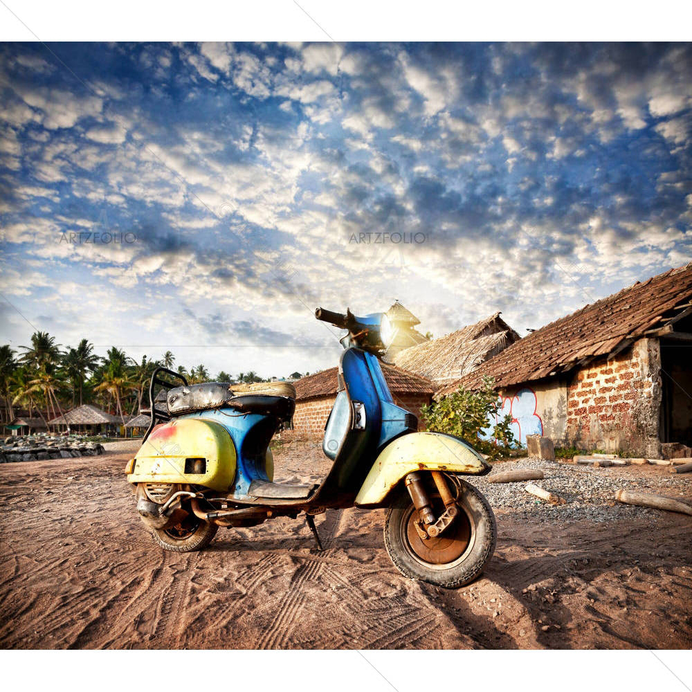 Old Retro Scooter On The Sandy Beach