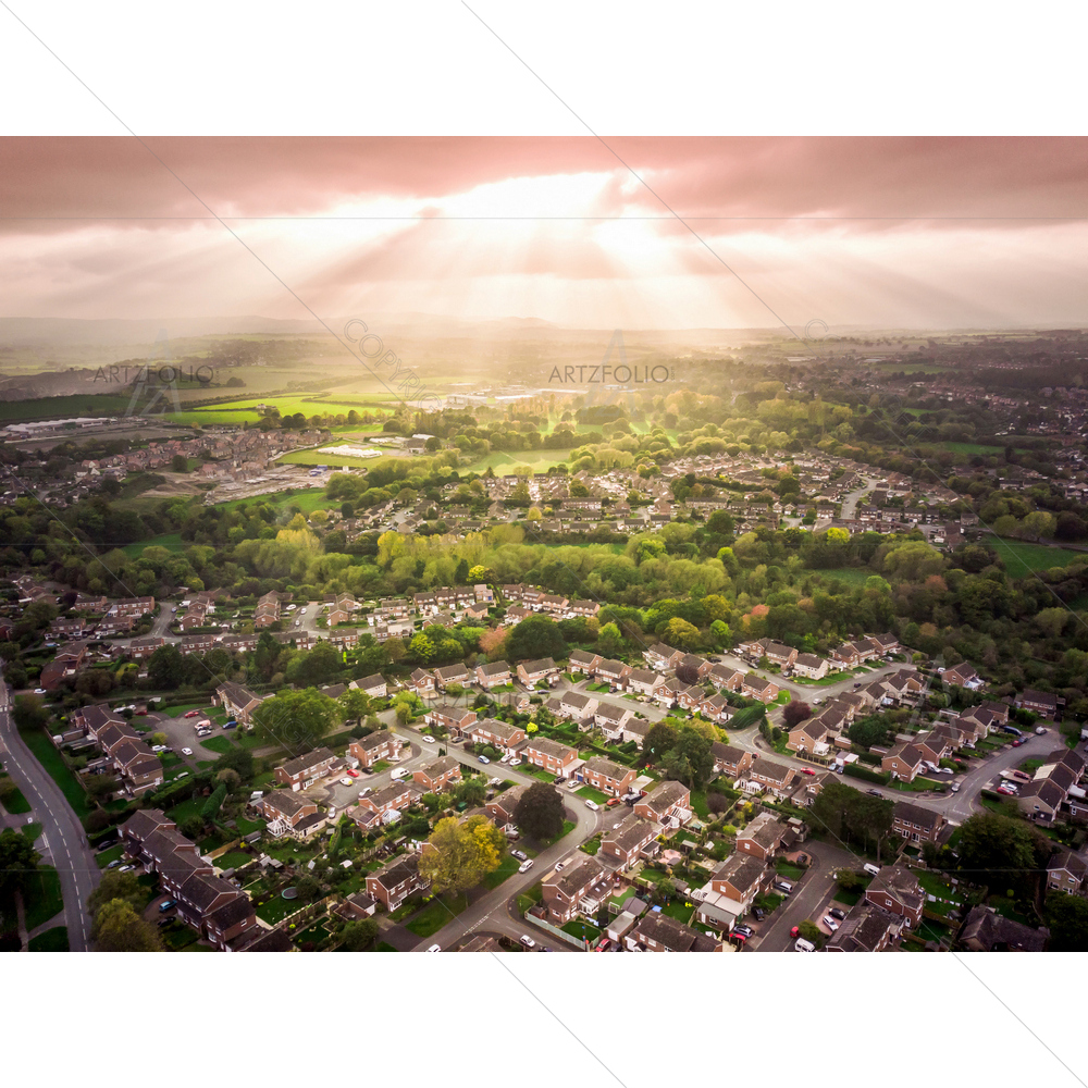Sun Bursting Through Clouds Over British Houses — custom-size art design 5013163